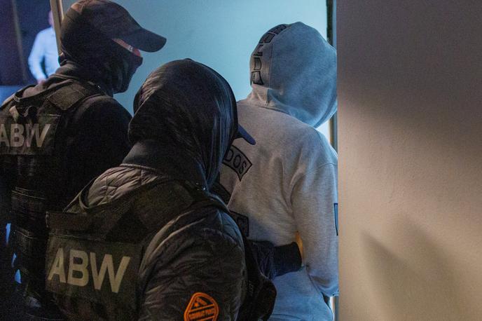 ABW | Osumljenca so prijeli uslužbenci poljske obveščevalne službe ABW v sodelovanju s policijo in ameriškimi organi. | Foto Profimedia