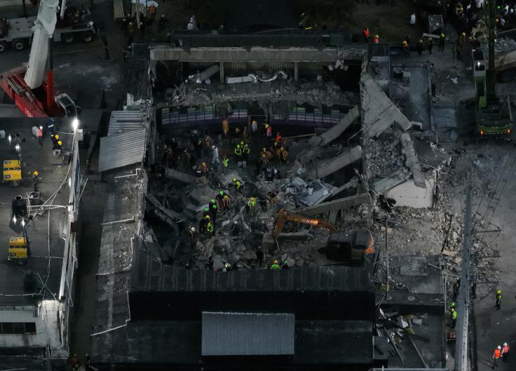 "Tu bomo, dokler ne bomo našli vseh, živih ali mrtvih," je poudaril direktor Centra za nujne primere (COE) Juan Manuel Mendez. | Foto: Reuters
