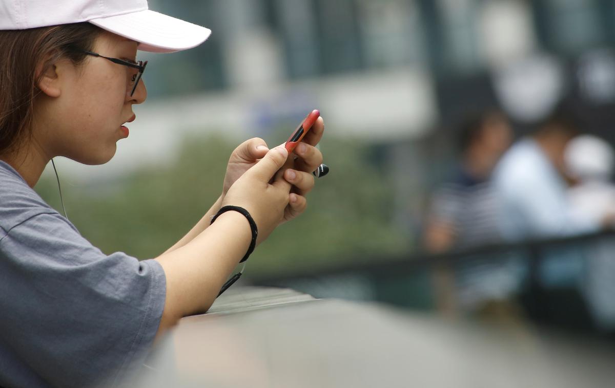 Kitajska, mobilni telefon | Foto Reuters