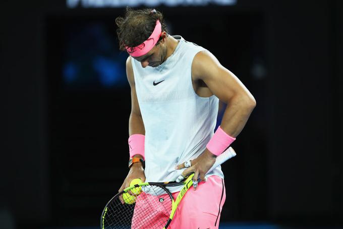 Rafael Nadal je moral v četrtfinalu OP Avstralije Čiliću predati dvoboj. | Foto: Guliverimage/Getty Images