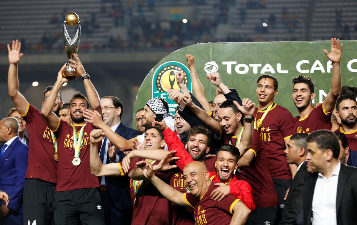 Esperance Sportiv | Nogometaši Esperance Sportive slavijo naslov afriškega klubskega prvaka, ki so ga osvojili za zeleno mizo. | Foto Reuters