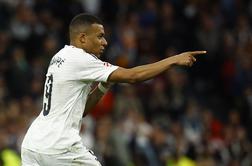 Real z golom v 95. minuti vsaj za dan prestavil slavje Barcelone