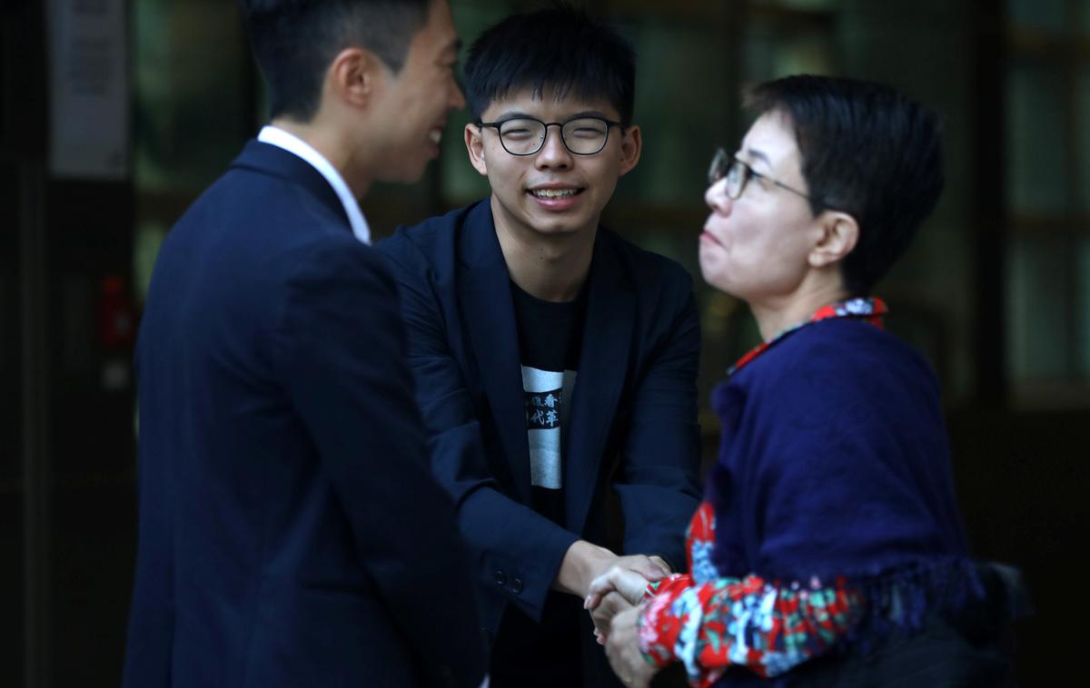 Kelvin Lam in Joshua Wong | Foto Reuters