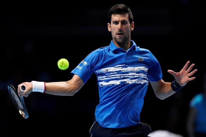 Novak Đoković | Novak Đoković je za prvo zmago na zaključnem turnirju potreboval le malce več kot eno uro. | Foto Reuters