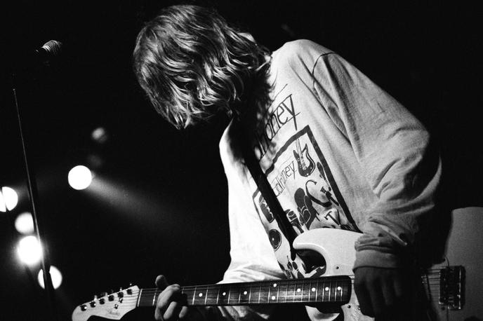 Kurt Cobain | Cobain, ki je v besedilih pesmi omenjal samomor, vero in droge, je umrl 5. aprila 1994, star 27 let. Nirvana, ki je nastala leta 1987, je s Cobainovo smrtjo razpadla. | Foto Guliverimage