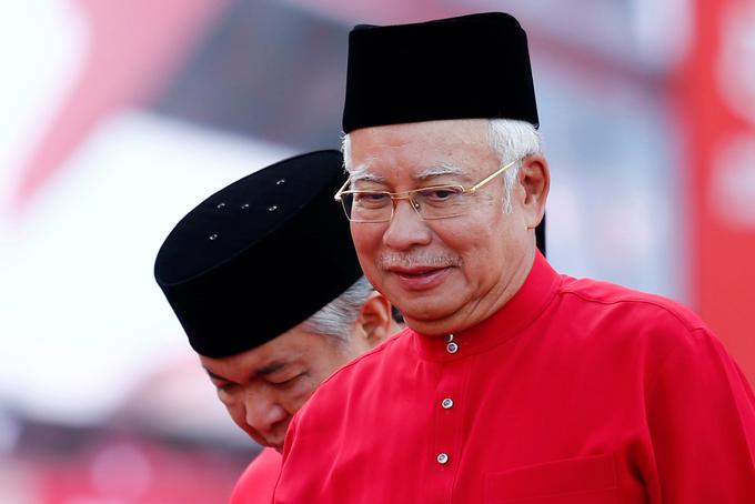 Najib zavrača obtožbe o korupciji, vladna preiskava pa ga je oprala krivde. | Foto: Reuters