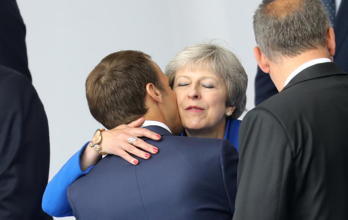 Emmanuel Macron in Theresa May | Foto Reuters