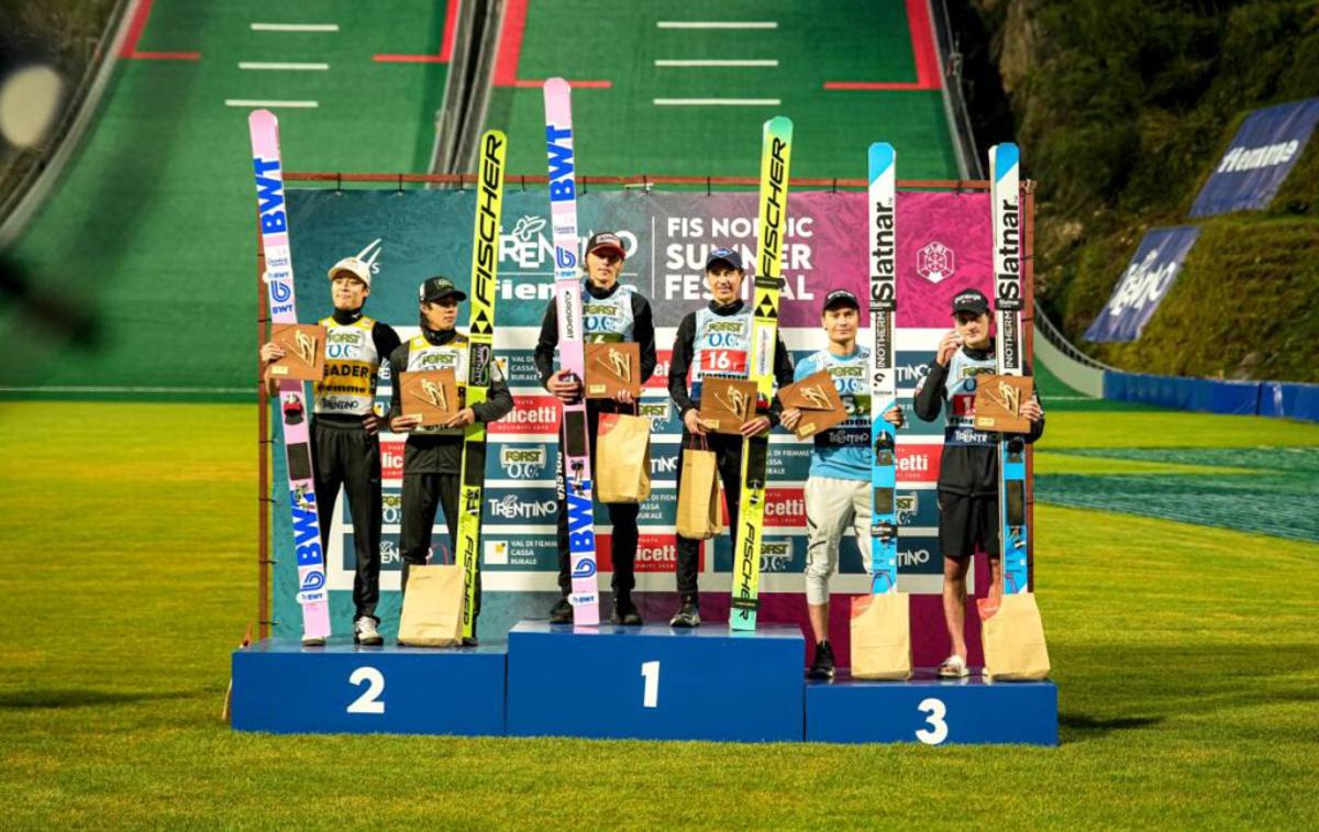 Predazzo, Domen Prevc, Anže Lanišek | Domen Prevc in Anže Lanišek sta super ekipno tekmo v Predazzu končala na odru za zmagovalce. | Foto Nordic Focus