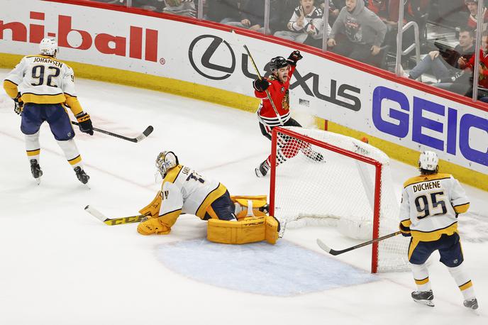 Alex DeBrincat Chicago | Alex DeBrincat je odločil zmagovalca v podaljšku dvoboja v Chicagu. | Foto Reuters