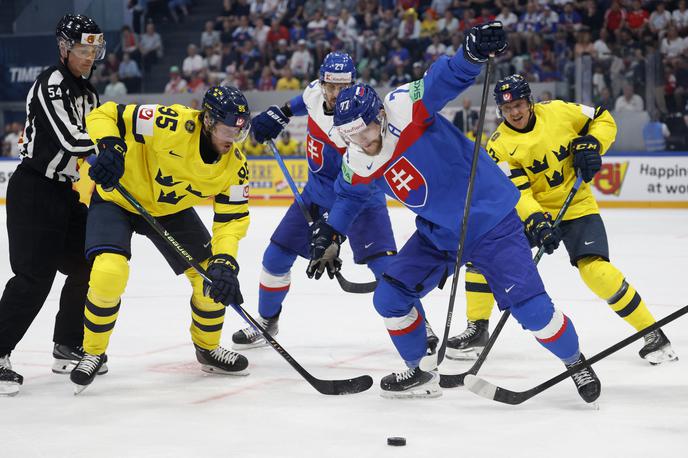 SP v hokeju: Slovaška - Švedska | Švedi so si napredovanje v četrtfinale priborili prav na zadnji tekmi predtekmovanja, ko so s 4:2 premagali Slovaško.  | Foto Reuters