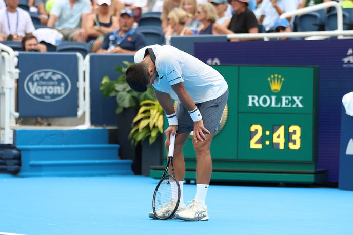 Novak Đoković | Srbski teniški zvezdnik Novak Đoković je zaradi slabega počutja izpadel že v drugem krogu turnirja v Cincinattiju. | Foto Guliverimage