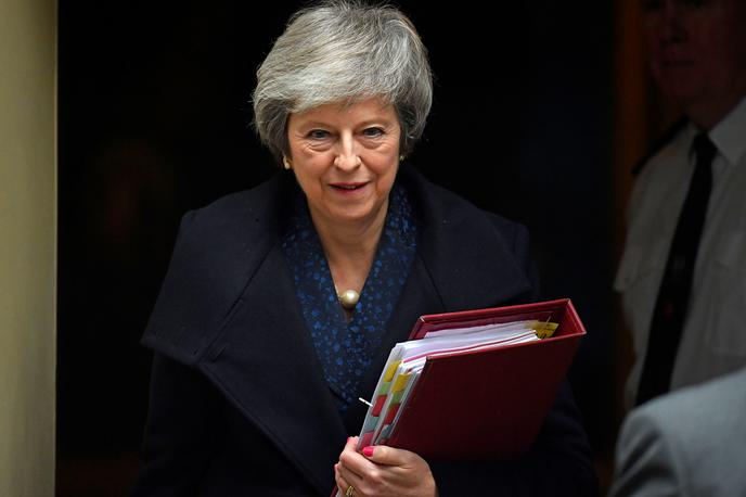 Theresa May | "Imamo odgovornost, da najdemo pot naprej, ki bo zagotovila podporo parlamenta," je dejala britanska premierka Theresa May. | Foto Reuters