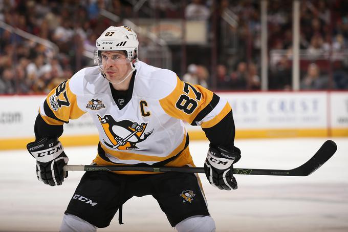 Kapetan Pingvinov Sydney Crosby se je s tisočo točko, doseženo v ligi NHL, vpisal v hokejsko zgodovino. | Foto: Getty Images