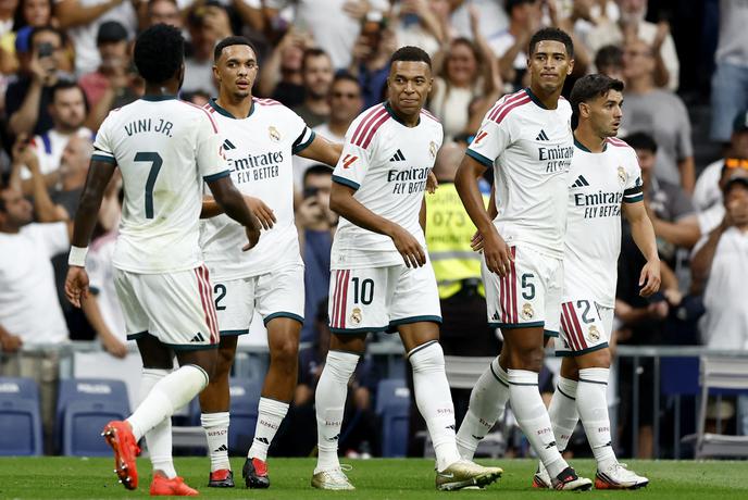 Real zanesljivo prek Malage in spet pred Oblakov Atletico