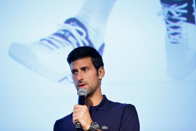 Pri novem tekmovalnem sistemu ima prste vmes tudi Novak Đoković. | Foto: Guliverimage/Getty Images