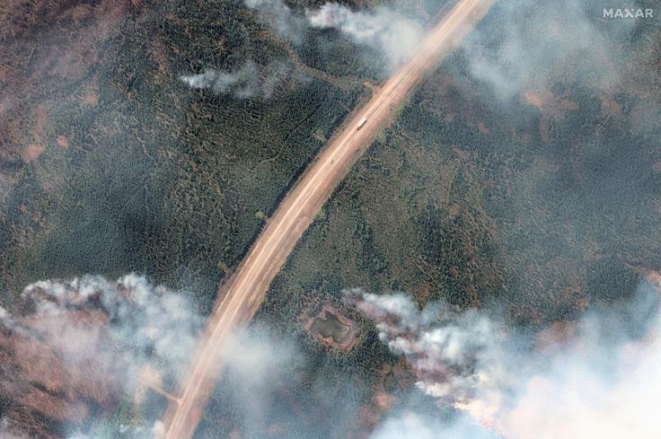 Požari v Kanadi še ogrožajo mesta in prebivalce.  | Foto: Reuters