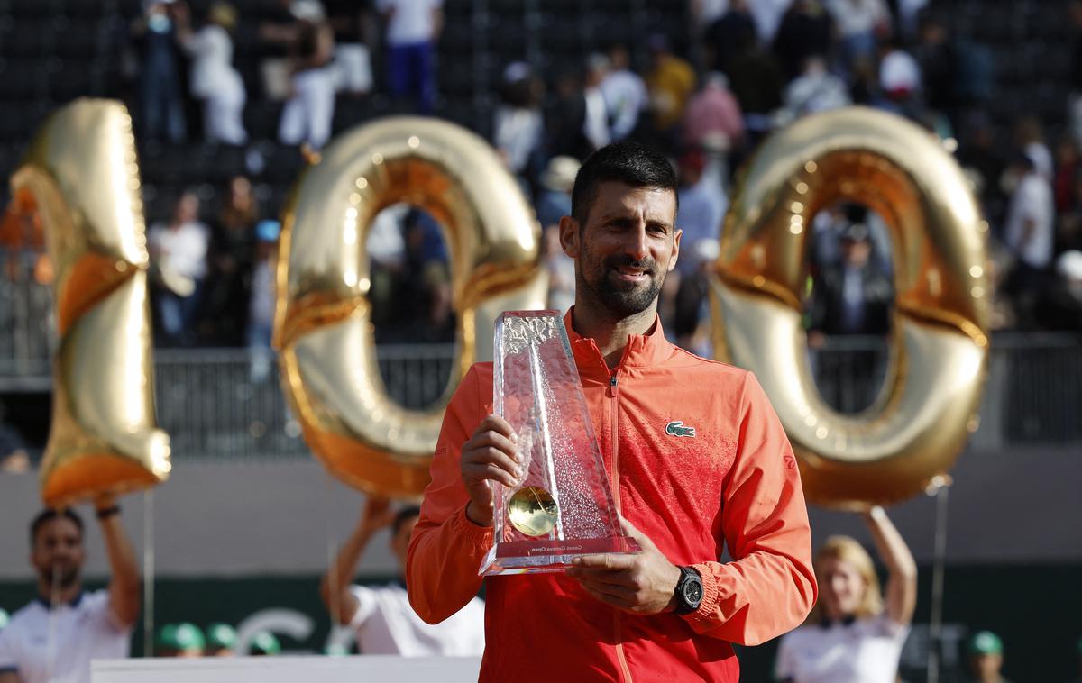 Novak Đoković | Novak Đoković je prišel do 100. turnirske lovorike. Kaj to pomeni za OP Francije, ki se začenja danes? | Foto Reuters