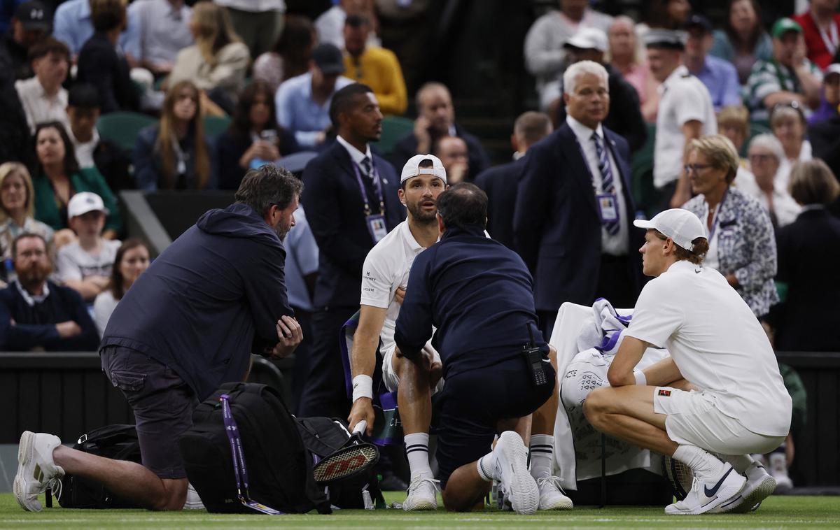 Jannik Sinner  : Grigor Dimitrov | Grigor Dimitrov je proti Janniku Sinnerju vodil z 2:0 v nizih, v tretjem pa je pri rezultatu 2:2 zaradi poškodbe predal dvoboj. | Foto Reuters