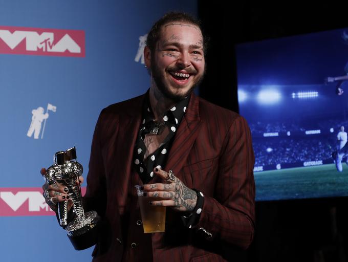 Post Malone je na včerajšnji podelitvi nagrad MTV za najboljše videospote dobil nagrado za pesem leta.  | Foto: Reuters