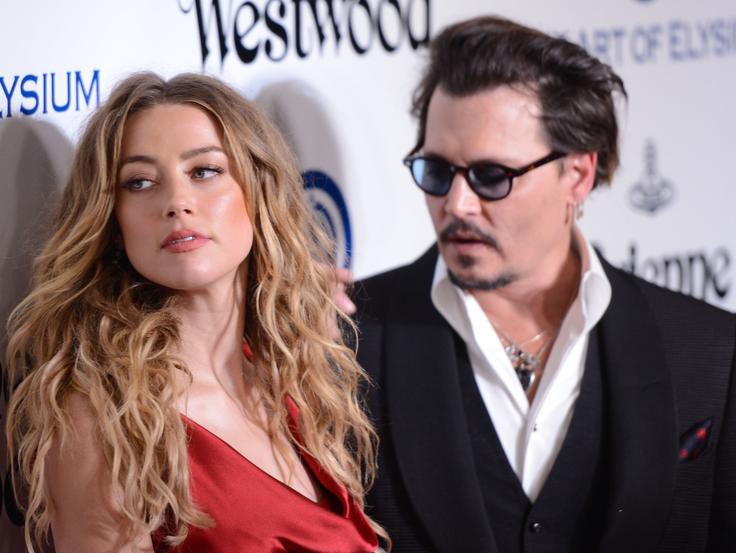 Johnny in Amber sta bila poročena le dobro leto, nato je igralka vložila zahtevo za ločitev. | Foto: Getty Images