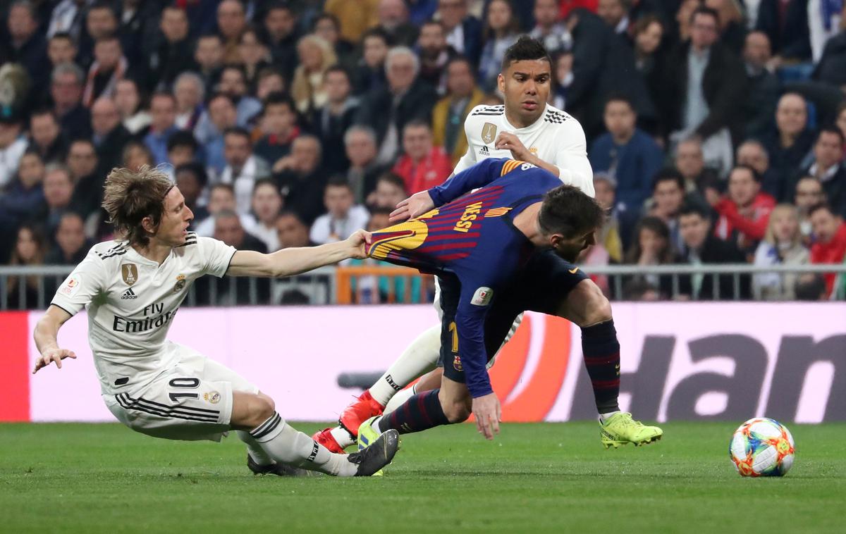 Luka Modrić, Lionel Messi | Lionel Messi in soigralci lahko Luko Modrića in druščino dokončno vržejo iz igre za naslov. | Foto Reuters