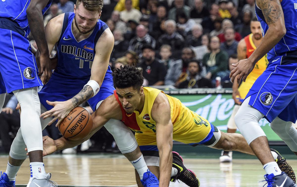 Luka Dončić | Luka Dončić je dosegel prvi trojni dvojček v ligi NBA. | Foto Reuters