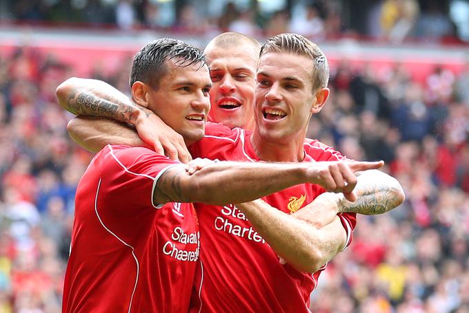 Dejan Lovren in Jordan Henderson sta soigralca pri Liverpoolu. Danes zvečer se bo smejalo le enemu. | Foto: Reuters