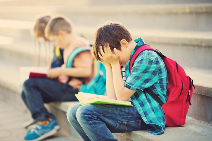 Otroci morajo do neke mere odgovornosti in celo stiske, vezane na šolo, prevzeti nase. Starši jim nudimo ob tem oporo in jim prisluhnemo, če potrebujejo pogovor. | Foto: Getty Images
