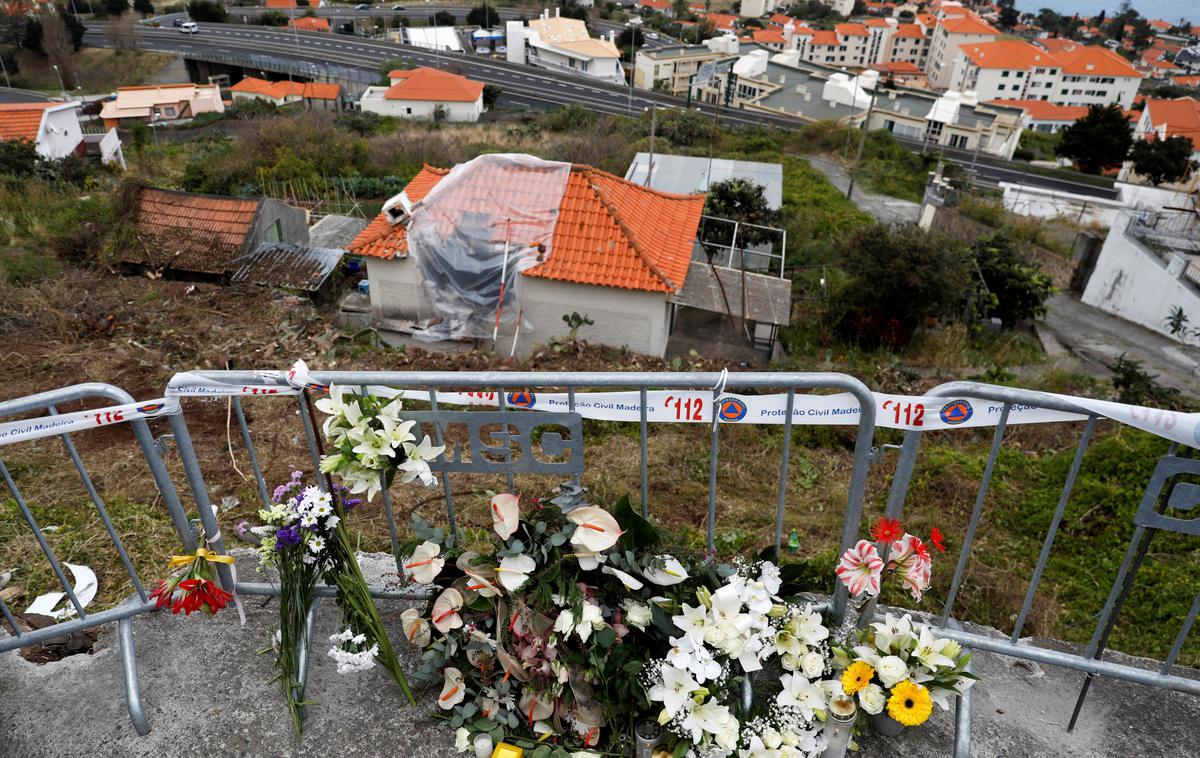 Madeira | Na Madeiri so se danes z žalnimi slovesnostmi in mašami poslovili od vseh 29 nemških turistov, ki so v umrli v sredo. | Foto Reuters