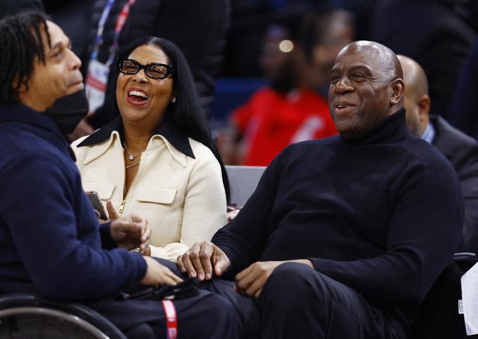 ... in nekdanji zvezdnik lige NBA Earvin Magic Johnson. | Foto: Reuters