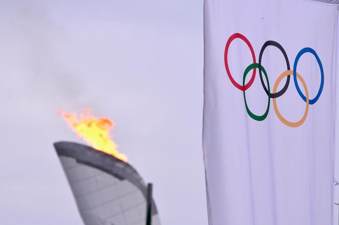 Ogenj in zastava: danes neločljivi del olimpijskih iger. | Foto: 