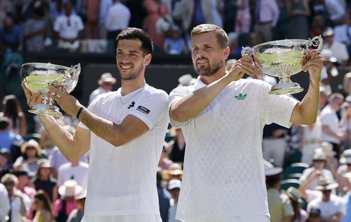Wimbledon dvojice 2025 finale | Britanca Julian Cash in Lloyd Glasspool sta letošnja zmagovalca Wimbledona v moških dvojicah. | Foto Reuters