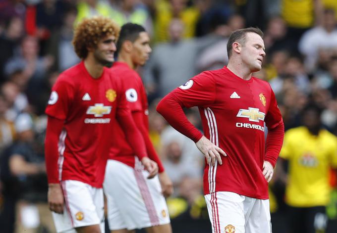 Navijači Uniteda Wayna Rooneyja po vsaki tekmi pribijajo na križ. | Foto: Reuters