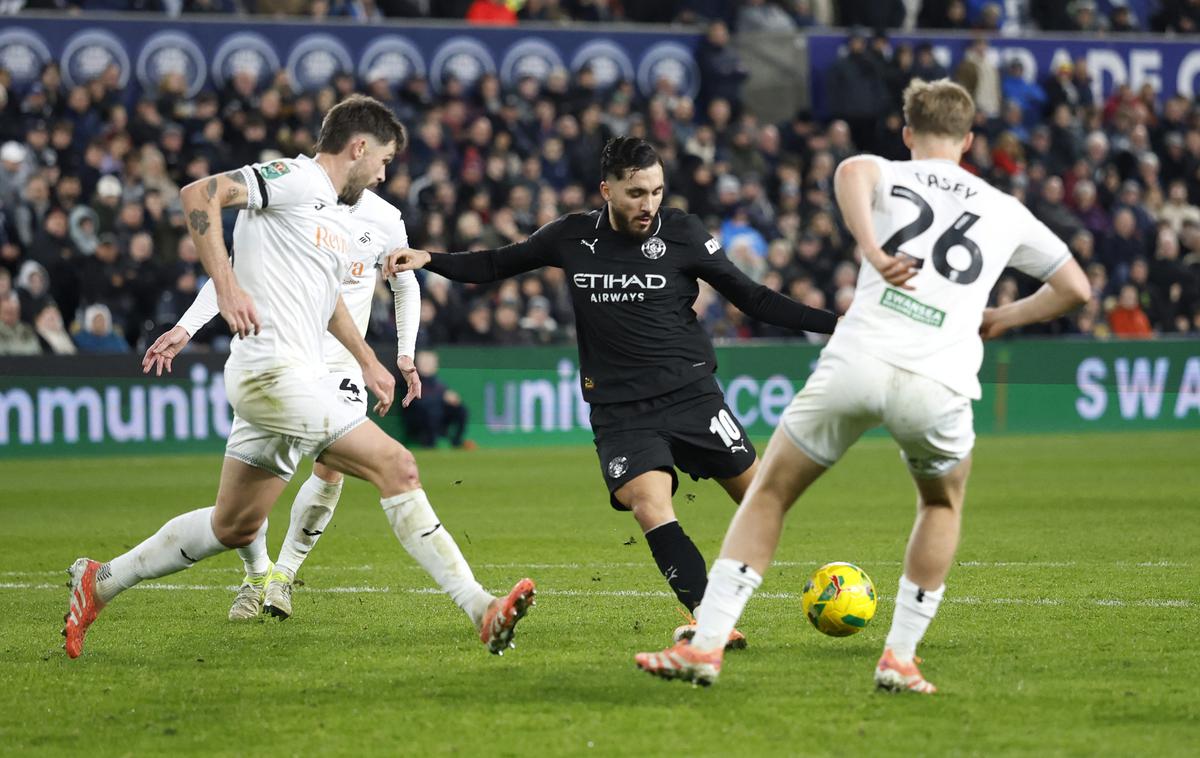 Swansea - Manchester City | Manchester City je izločil Swansea Žana Vipotnika. | Foto Reuters