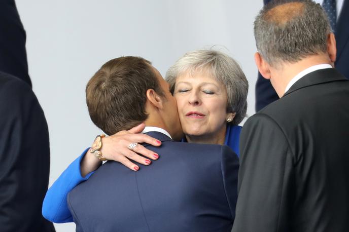 Emmanuel Macron in Theresa May | Foto Reuters