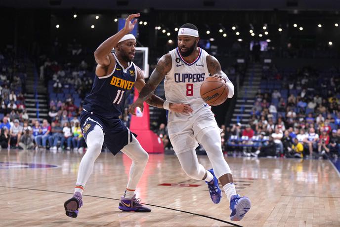 Nekdanji košarkar lige NBA priprt zaradi goljufije
