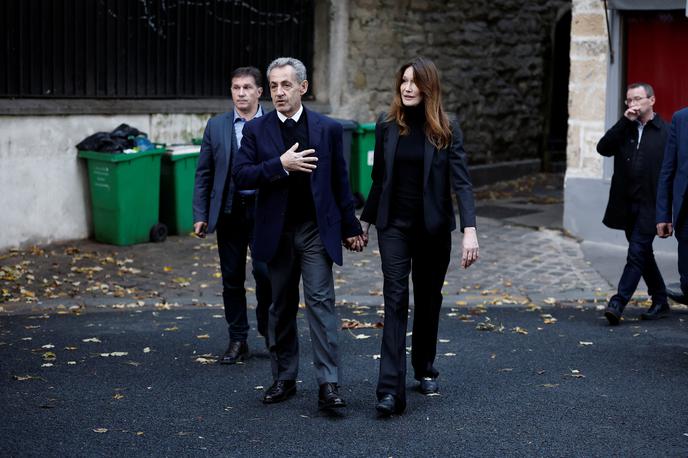 Nicolas Sarkozy, Carla Bruni-Sarkozy | Nekdanjega francoskega predsednika Nicolasa Sarkozyja je pospremila žena, nekdanja vrhunska manekenka Carla Bruni-Sarkozy. Na obsodbo se je Sarkozy pritožil. | Foto Reuters