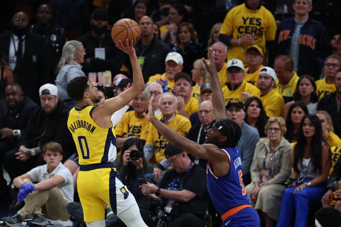 Tyrese Haliburton | Tyrese Haliburton je blestel ob zmagi Indiane, ki v seriji na štiri zmage zdaj vodi s 3:1. | Foto Reuters