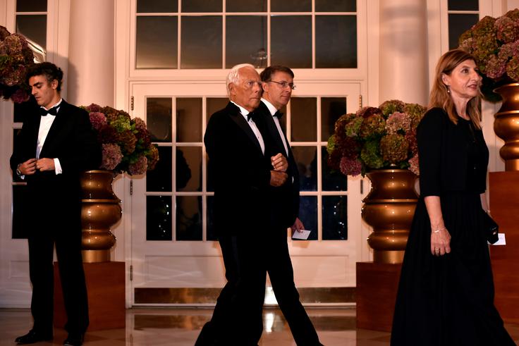 Na večerjo je bil povabljen tudi italijanski modni oblikovalec Giorgio Armani. | Foto: Reuters