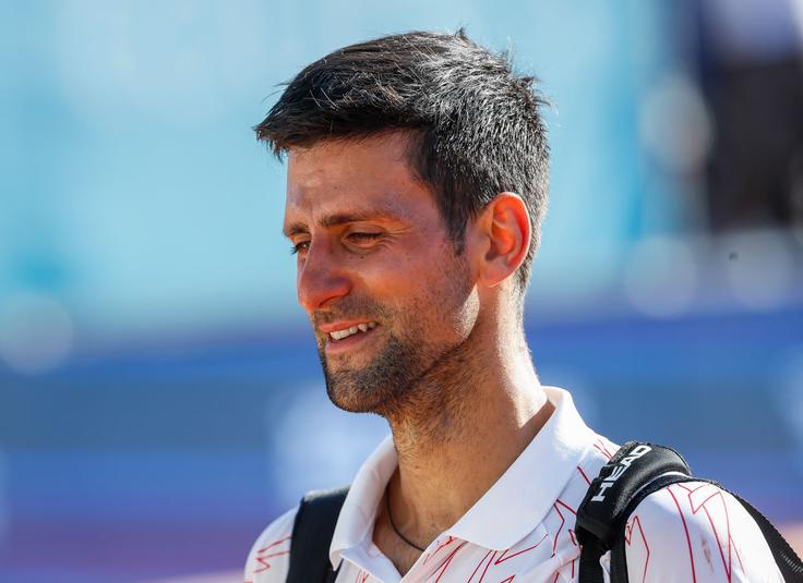 Novak Đoković je plačal visoko ceno, potem ko se je tudi on okužil z novim koronavirusom. | Foto: 