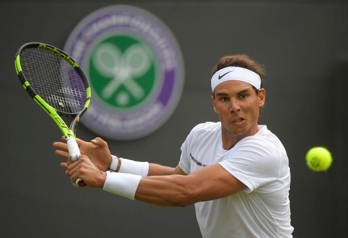 Rafael Nadal je slavil 50. zmago v Wimbledonu. | Foto: Reuters