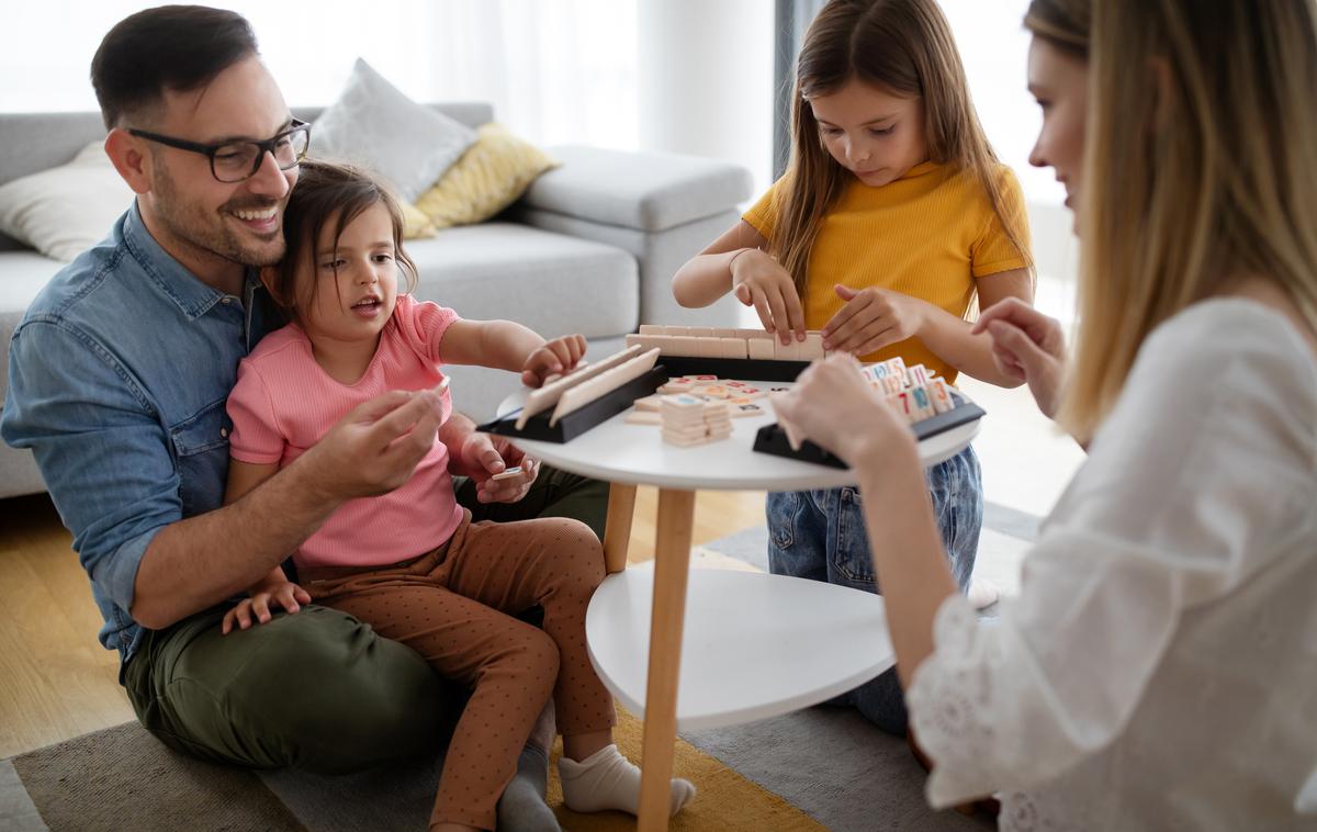 družabne igre, družina | Leta 2023 bomo za praznike doma tri dni več kot letos. | Foto Getty Images