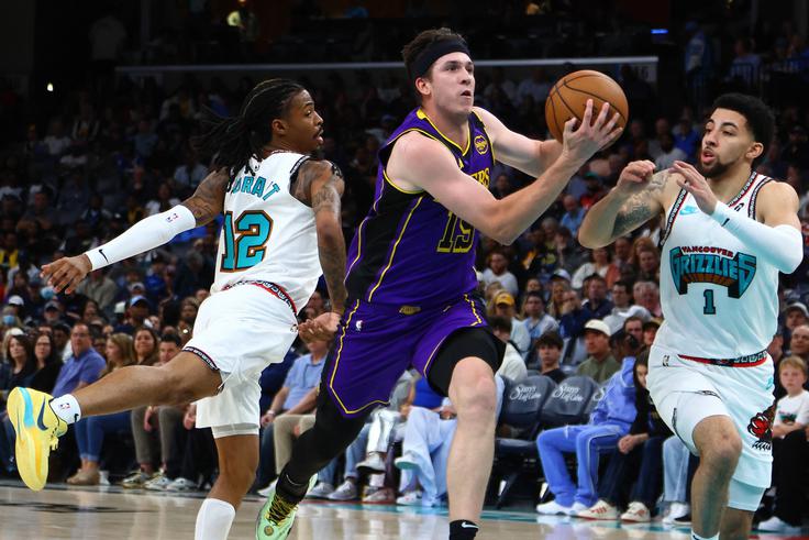 Austin Reaves je bil prvi strelec Lakersov. | Foto: Reuters