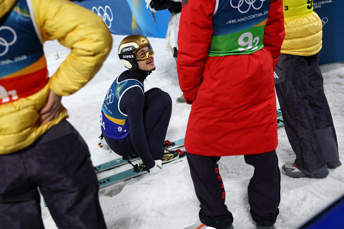 Philipp Raimund | Nemški smučarski skakalec Philipp Raimund je v soboto po tekmi na veliki skakalnici doživel neprijetno srečanje s slovenskimi navijači v Predazzu. | Foto Reuters