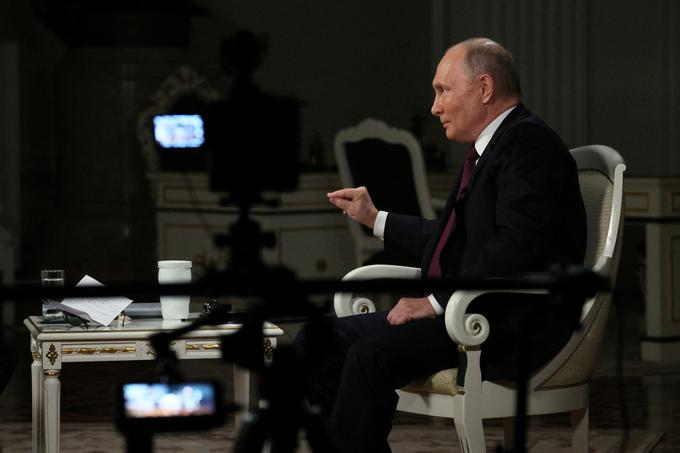 Tucker Carlson, Vladimir Putin, intervju | Foto: Reuters