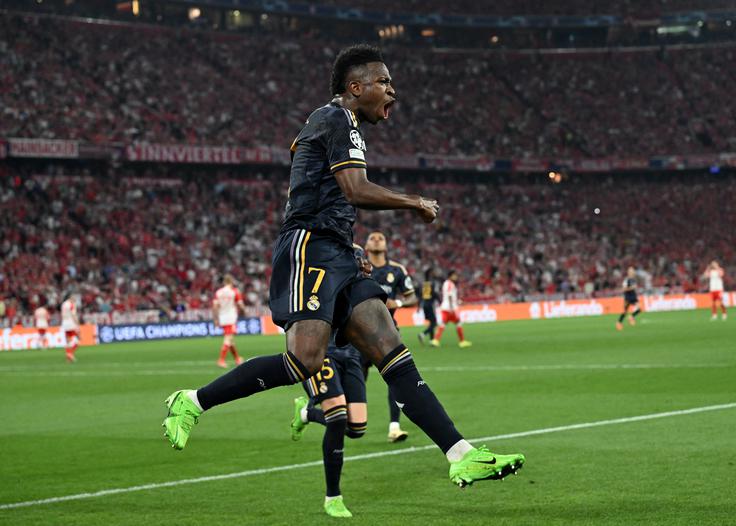 Končni izid tekme v Münchnu je z bele točke postavil Vinicius Junior z 2:2. | Foto: Reuters