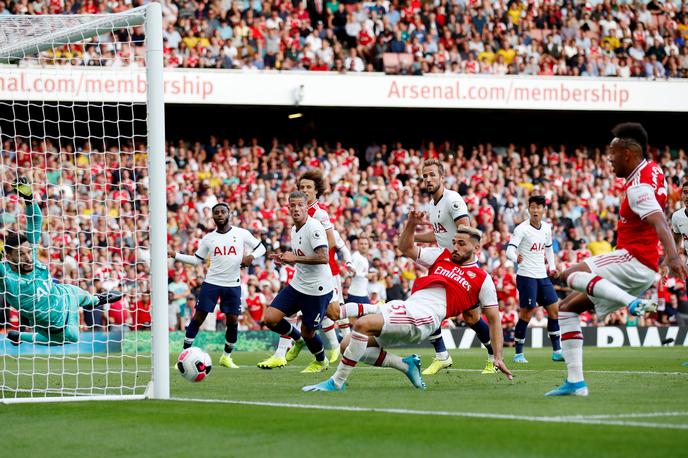 Arsenal Tottenham | Arsenal je proti Tottenhamu zaostajal z 0:2, na koncu pa iztržil točko. | Foto Reuters