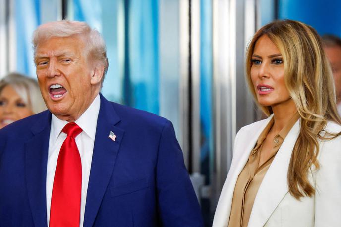 Donald Trump Melania Trump | Trumpa leta 2018 ni presenetilo, da je Slovenija dala takrat za obrambo manj kot odstotek BDP. Kot se je pošalil, zato ker pozna svojo ženo Melanio. | Foto Reuters