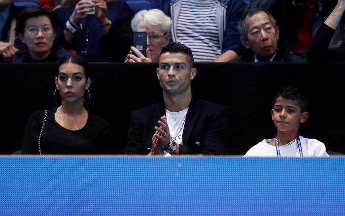 Srečanje Isnerja in Đokovića je z družino spremljal tudi nogometni zvezdnik Cristiano Ronaldo. | Foto: Reuters
