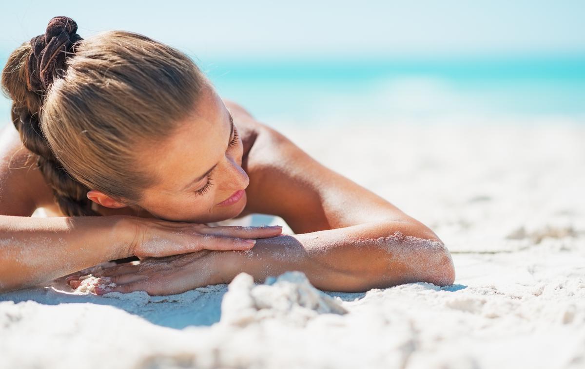 sončenje plaža ženska | Foto Thinkstock